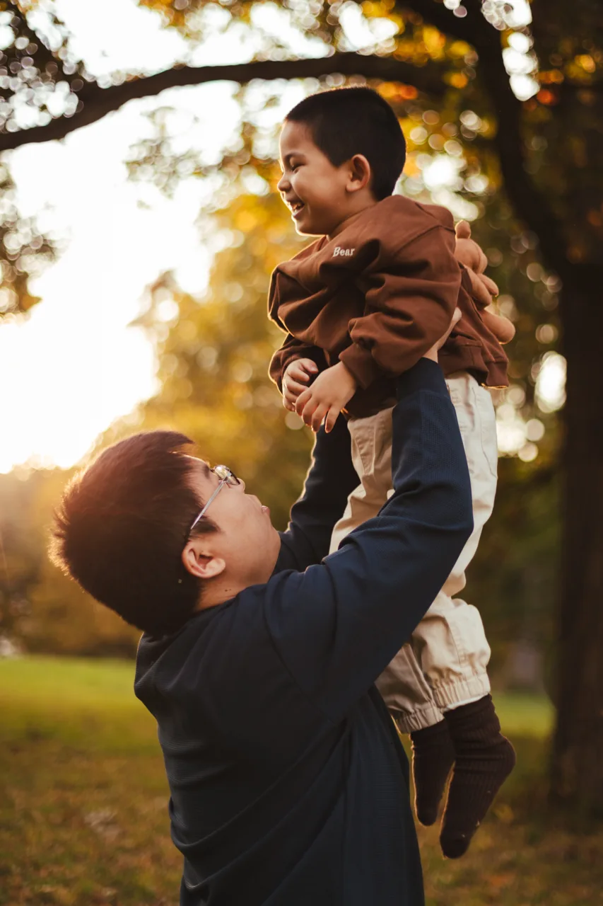 A family sharing a moment together outdoors